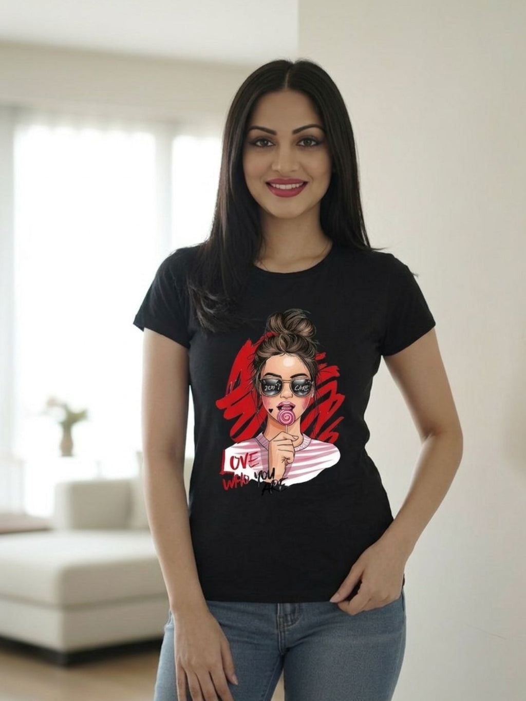 Black women's graphic t-shirt featuring a stylish girl illustration with sunglasses and "Love Who You Are" statement artwork.