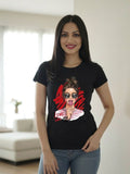 Black women's graphic t-shirt featuring a stylish girl illustration with sunglasses and "Love Who You Are" statement artwork.