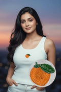 Women's white cotton ribbed tank top featuring a handcrafted orange blossom beaded motif by CherryPop.