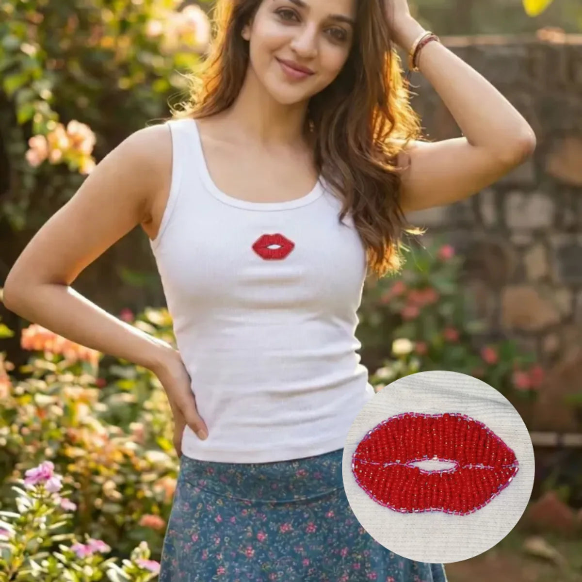 Woman wearing a CherryPop red lips hand-beaded cotton rib tank top with a fitted sleeveless silhouette.